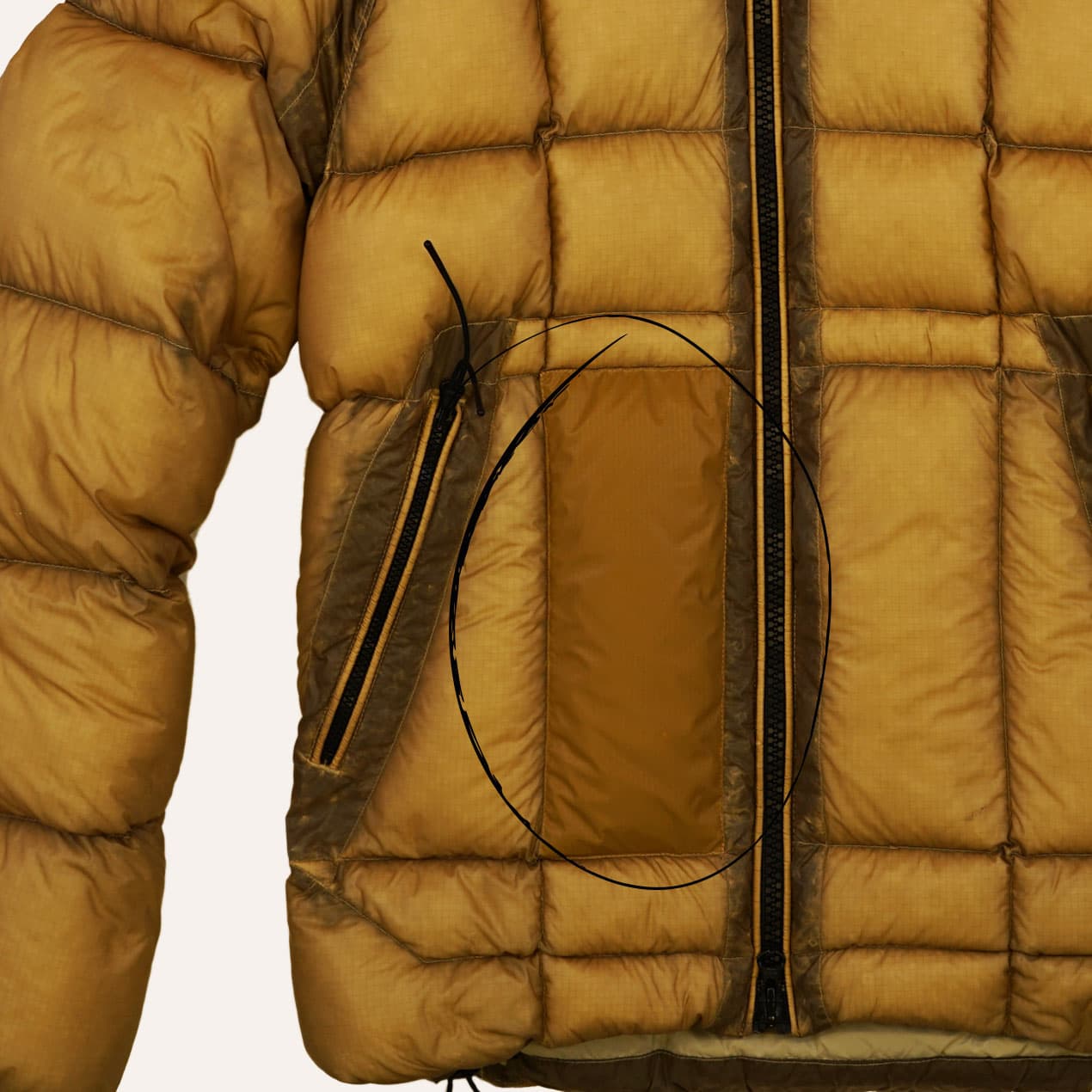Example 5: Yellow DD Shell jacket after lower panel replacement with a darker fabric.