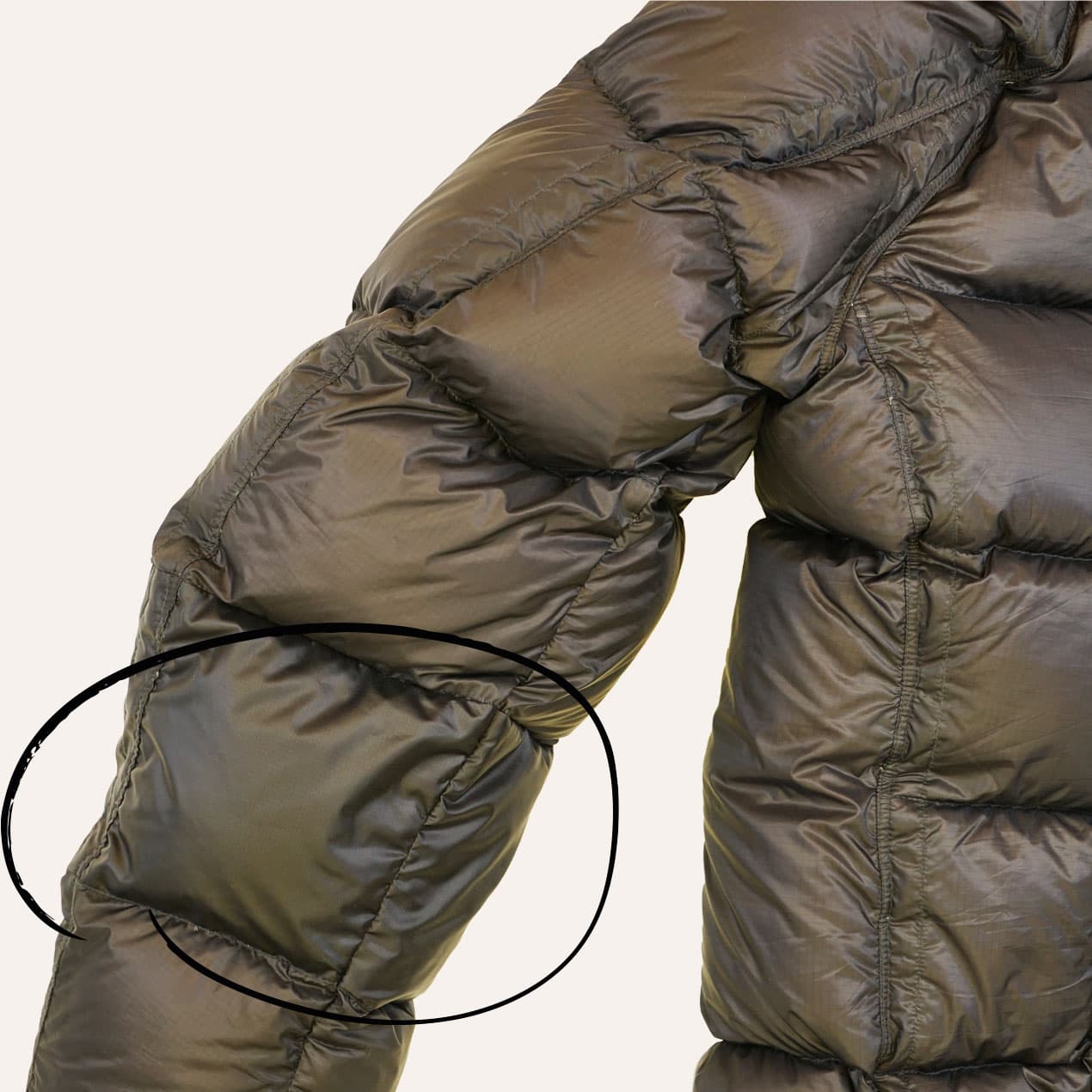 Example 8: Brown C.P. Company jacket after sleeve panel replacement with a similar material.