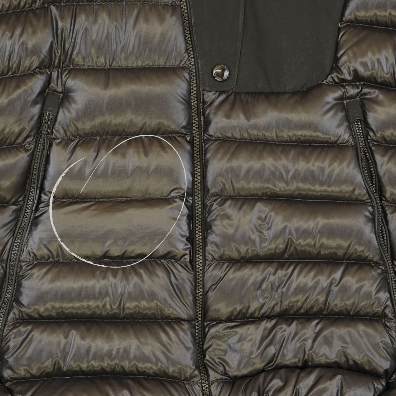 Example 9: Black DD Shell jacket after replacing the damaged panels with the same material.