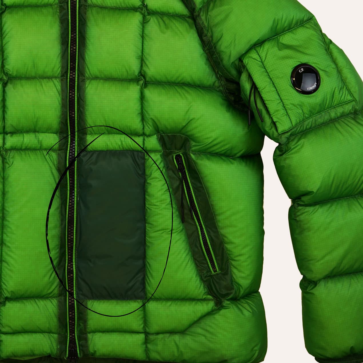 Example 10: Green DD Shell jacket after replacement of the damaged panel with a darker fabric.